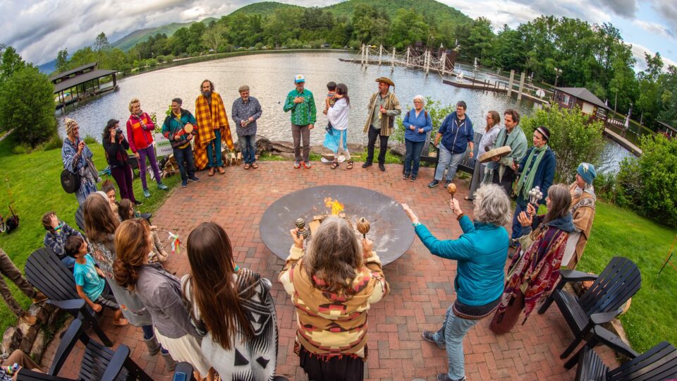 Ceremonial circle by Lake Eden with mountains in the background.